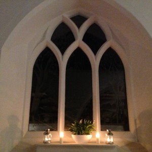 The candlelit Laurence Whistler Window
